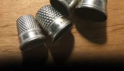 The Timeless Story of Thimbles: From Practical Tool to Cherished Keepsake